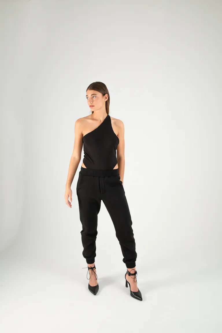 Pantalón jogger negro de frisa con cintura y botamanga elástica de Naíma en Pantalones para argentina