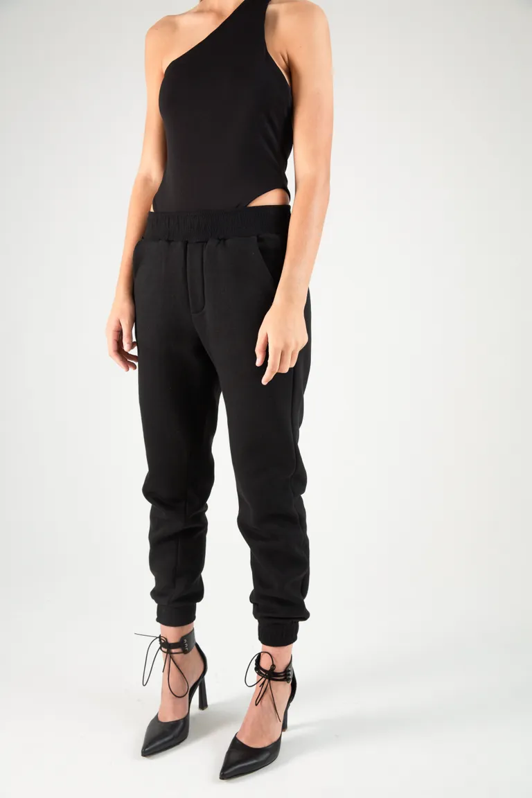 Pantalón jogger negro de frisa con cintura y botamanga elástica de Naíma en Pantalones para argentina