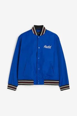 Campera baseball satén regular fit de H&M en Abrigos y Camperas para argentina
