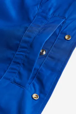 Campera baseball satén regular fit de H&M en Abrigos y Camperas para argentina
