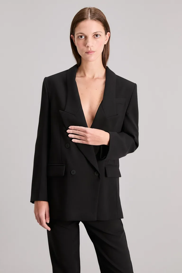 Blazer negro de corte regular con botones metálicos y detalles de diseño de Kosiuko en Blazers para argentina