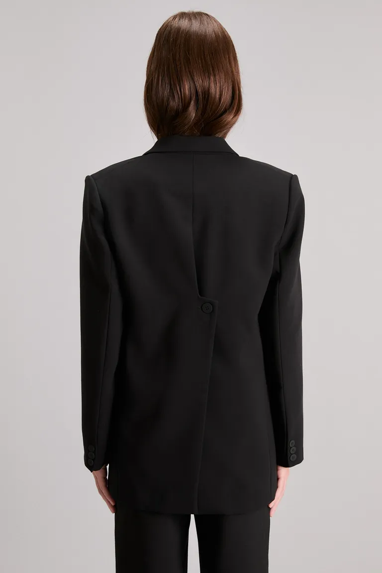 Blazer negro de corte regular con botones metálicos y detalles de diseño de Kosiuko en Blazers para argentina