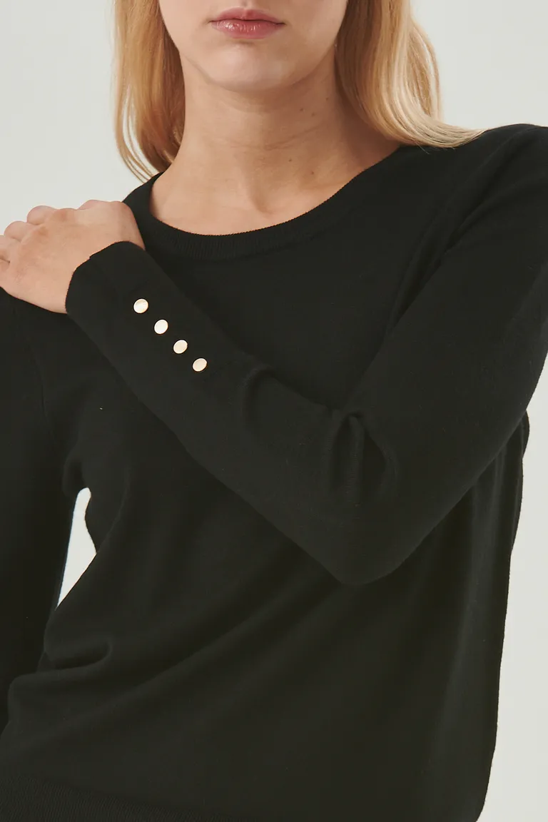 Sweater de punto negro con terminaciones acanaladas y detalles estructurados de Sweet en Buzos y Sweaters para argentina