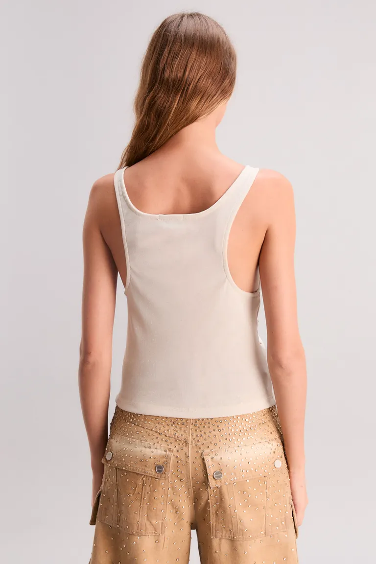 Musculosa de tul decorada con tachas en tono natural de Kosiuko en Tops para argentina