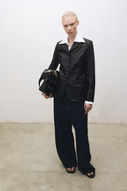Blazer cuero con botones de Mango en Blazers para argentina