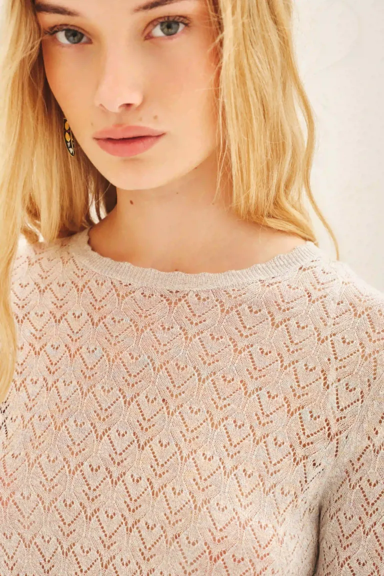 Remera femenina de punto con detalles de lurex para un look elegante y brillante de Rapsodia en Remeras para argentina