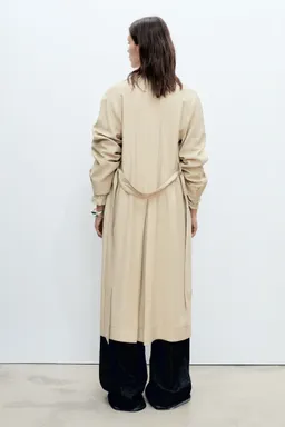 Trench suave con cinturón de Mango en Chaquetas para argentina