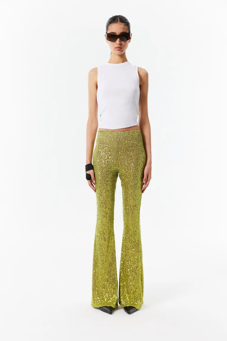 Pantalón de lentejuelas verde lima con corte acampanado y tiro alto de Naíma en Pantalones para argentina