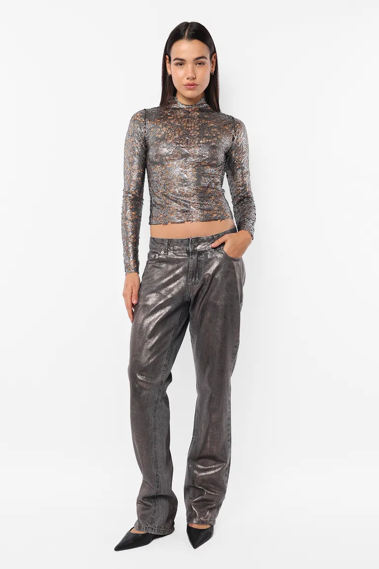 Top de manga larga con detalles metálicos y perforados en acabado semi-polera de Top White en Tops para argentina