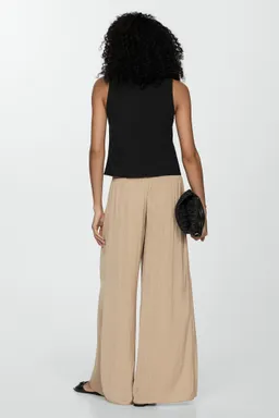 Pantalón fluido wideleg de Mango en Pantalones para argentina
