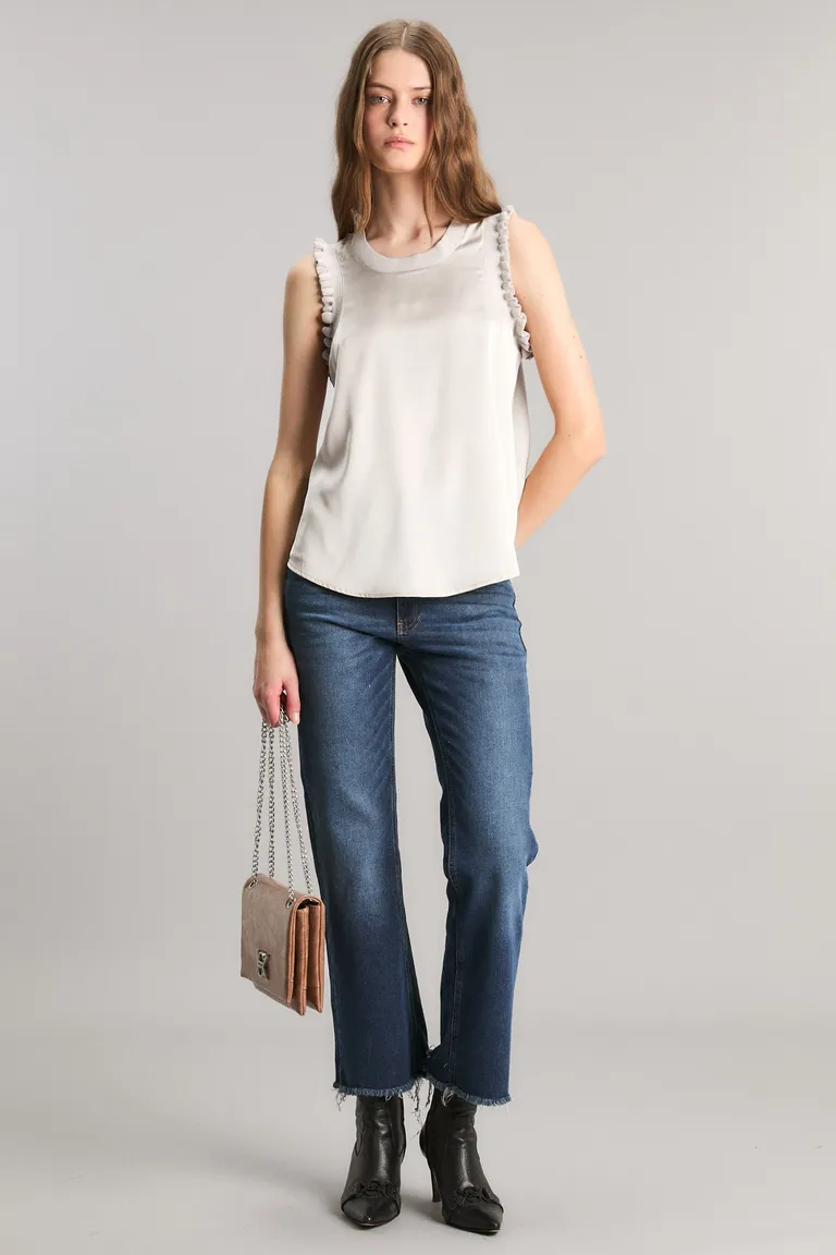 Top de saten brillante con detalles tejidos para un estilo casual y elegante de Kosiuko en Tops para argentina