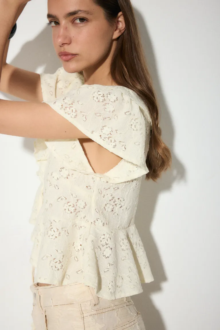 Blusa escote en V con volados y lazo delantero en tela elastizada de Audaz en Blusas para argentina