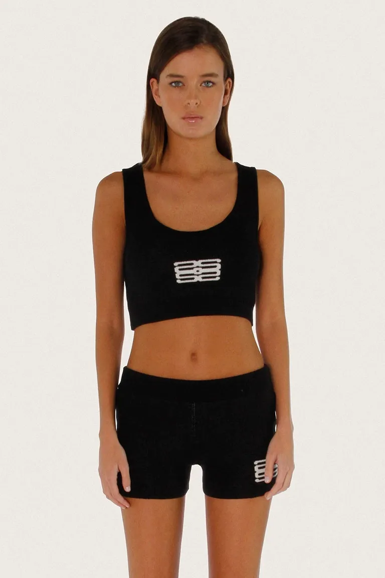 Top negro corto de viscosa con detalle jacquard para un estilo deportivo urbano de Sofia Sarkany en Tops para argentina