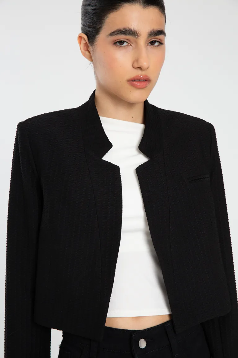 Blazer de punto negro con solapa sin quiebre y bolsillo ojal de Naíma en Blazers para argentina