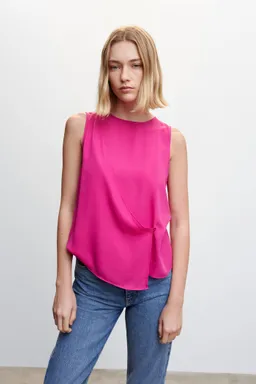 Blusa cruzada con botón de Mango en Blusas para argentina