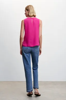 Blusa cruzada con botón de Mango en Blusas para argentina