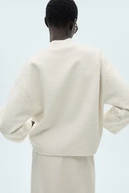 Sudadera bouclé cuello perkins de Mango en Buzos y Sweaters para argentina