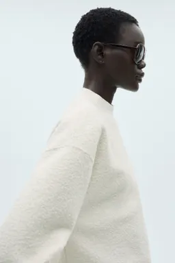 Sudadera bouclé cuello perkins de Mango en Buzos y Sweaters para argentina
