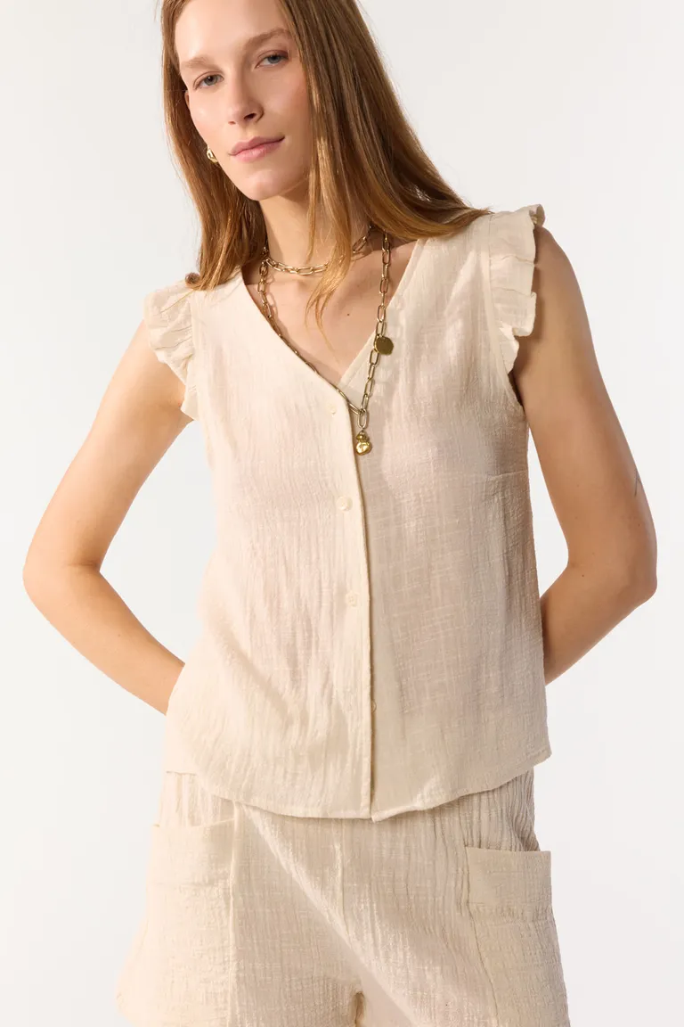 Top de algodón en escote en V con volados en la sisa de Cuesta Blanca en Tops para argentina
