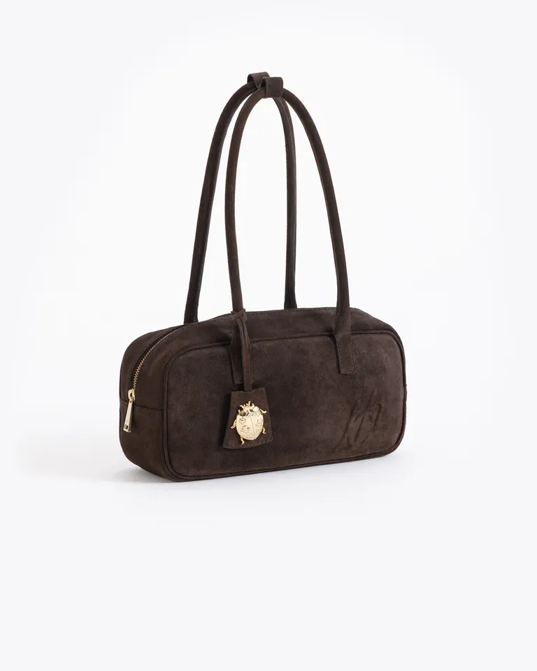 Cartera estructurada de tamaño funcional con detalle de dije colgante y manijas para llevar al hombro de Jazmin Chebar en Bolsos y Carteras para argentina