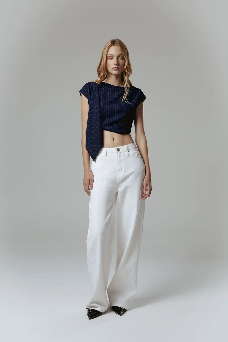 Pantalón wide leg en denim blanco de corte holgado y cierre reforzado para un look relajado y moderno de Naíma en Pantalones para argentina