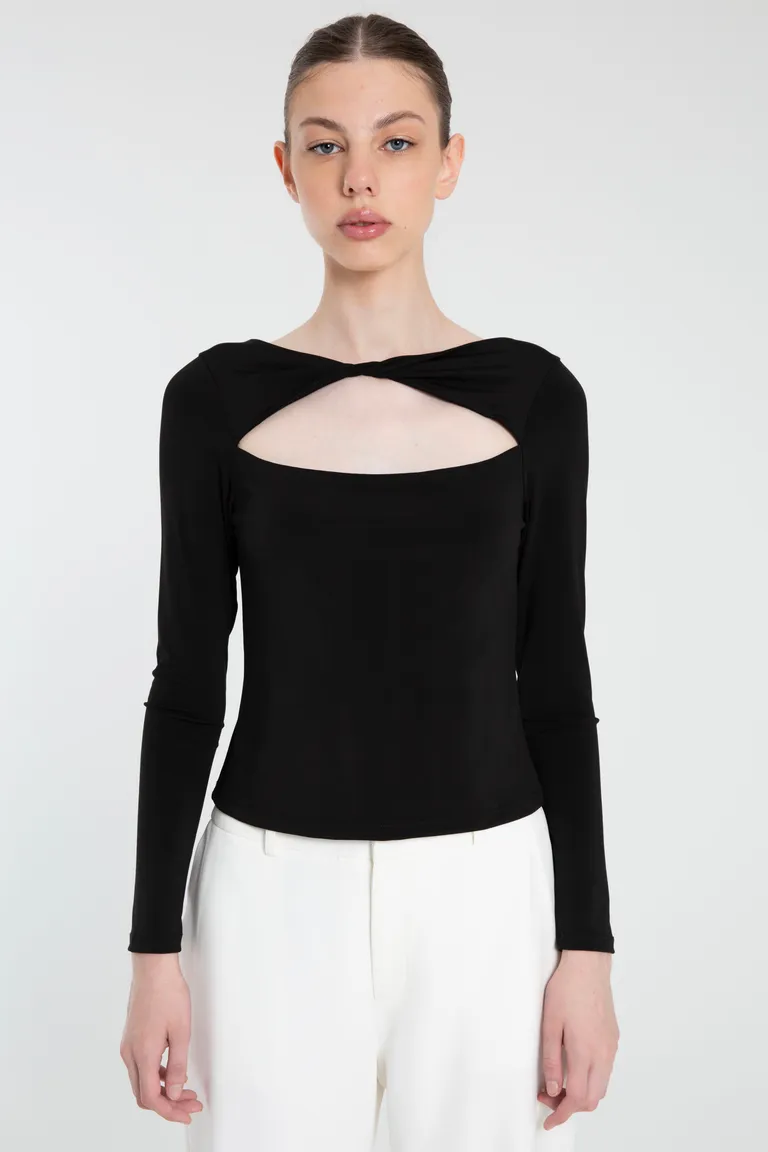 Elegante top de punto negro con escote central y manga larga de Naíma en Tops para argentina