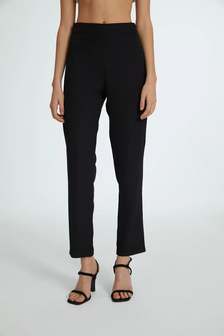 Pantalón de tiro alto en crepe sastrero con bolsillos laterales y cierre de broche en la cintura de Naíma en Pantalones para argentina