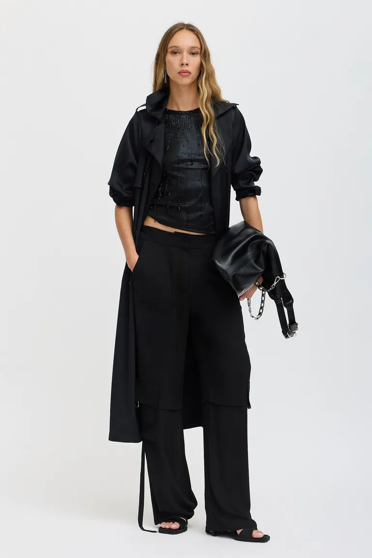 Musculosa de punto negra con bordados artesanales exclusivos de Tucci en Tops para argentina