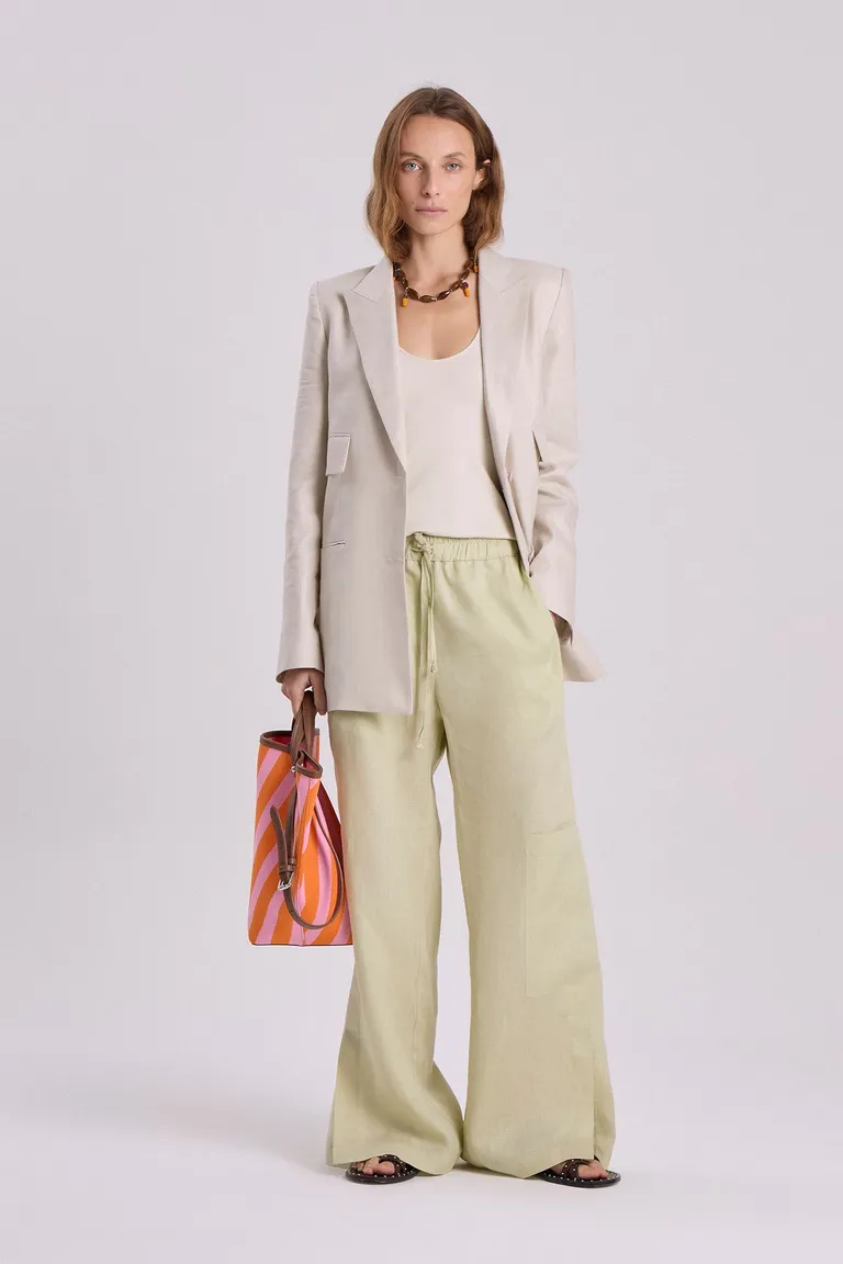 Pantalón de lino de corte recto y diseño relajado en tono verde de Maria Cher en Pantalones para argentina