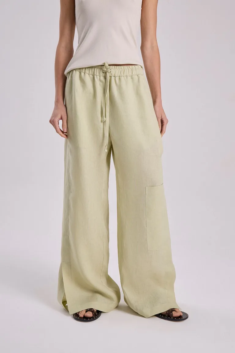 Pantalón de lino de corte recto y diseño relajado en tono verde de Maria Cher en Pantalones para argentina