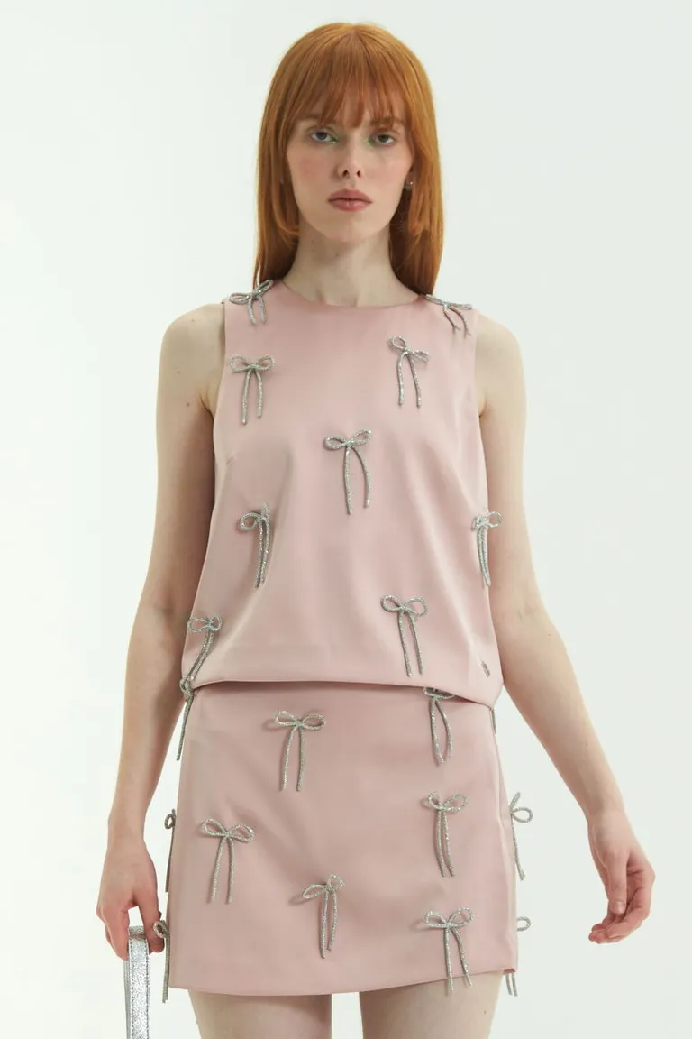 Falda satinada con moños brillantes - Pieza exclusiva y de alta calidad de Las Pepas en Faldas para argentina