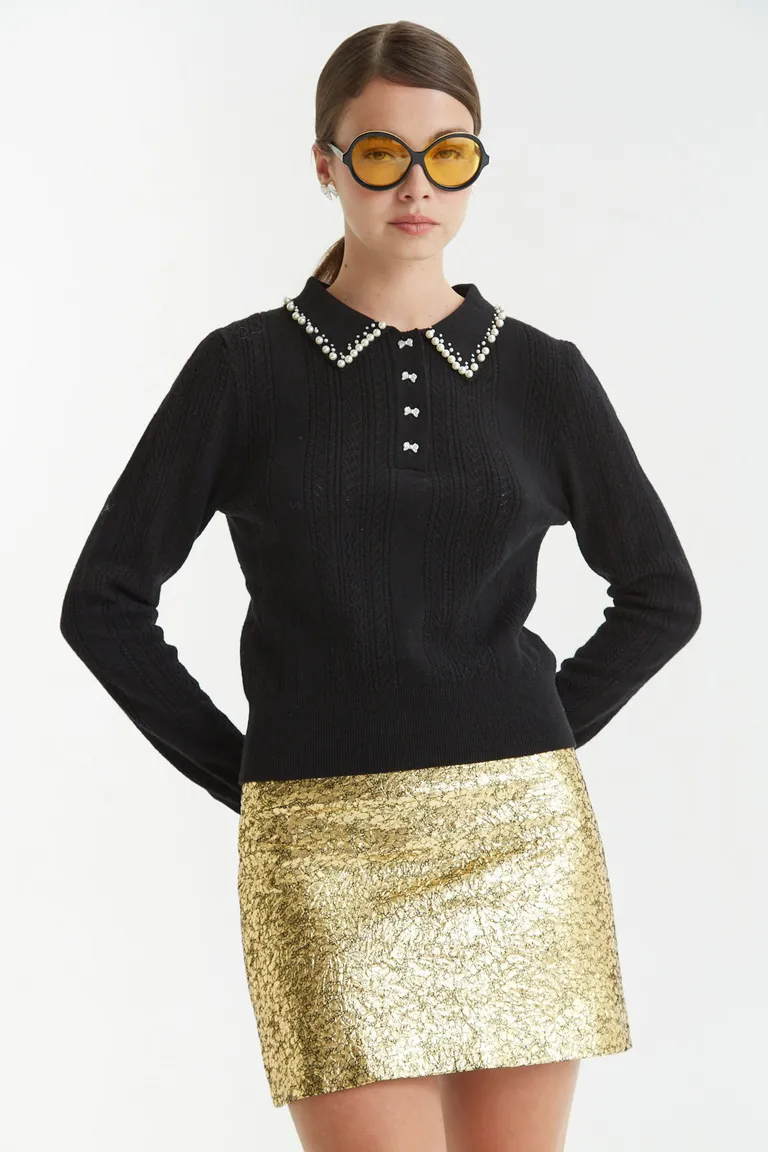 Mini falda corta de tiro bajo con textura arrugada y cierre lateral invisible de Las Pepas en Faldas para argentina