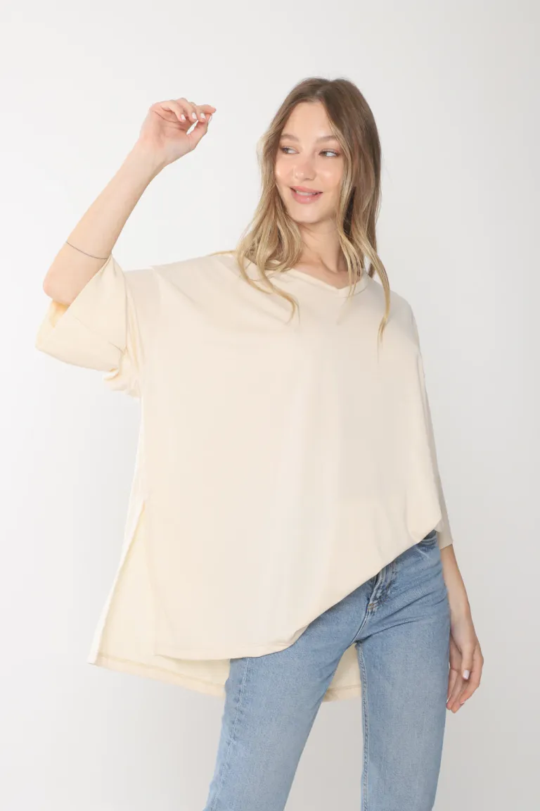 Remeron oversize de corte holgado y escote en V en tono blanco de Belle en Buzos y Sweaters para argentina