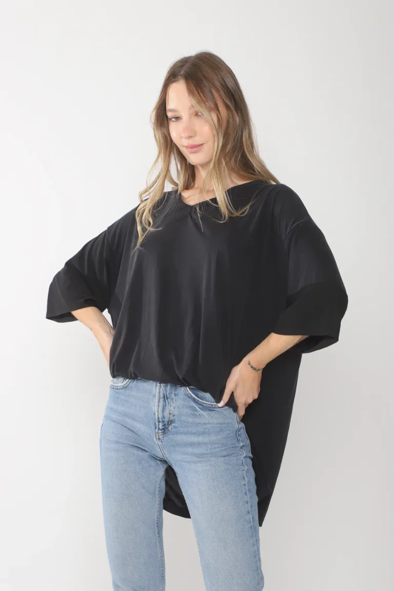 Remeron oversize de corte holgado y escote en V en tono blanco de Belle en Buzos y Sweaters para argentina
