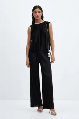 Pantalón wideleg plisado de Mango en Pantalones para argentina