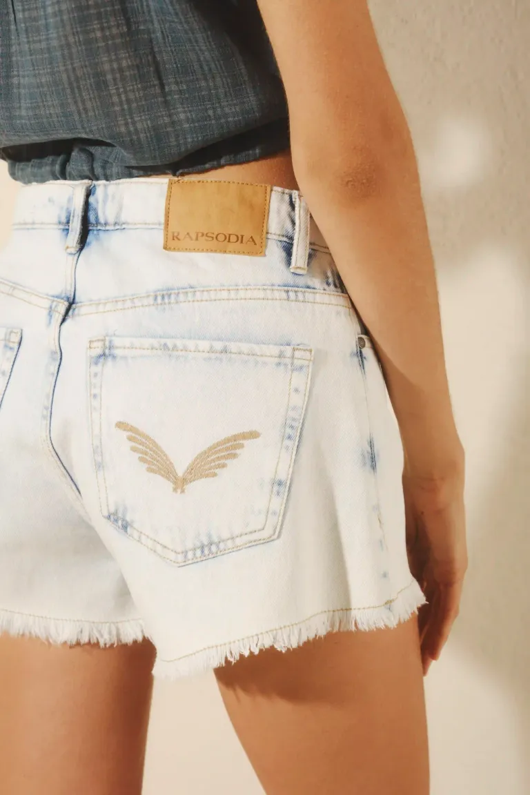 Shorts de denim desgastado con efecto lavado para un look de verano relajado de Rapsodia en Shorts para argentina