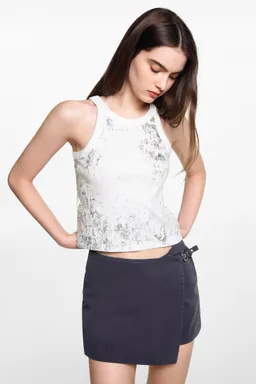 Top detalle metalizado de Mango Teen en Tops para argentina