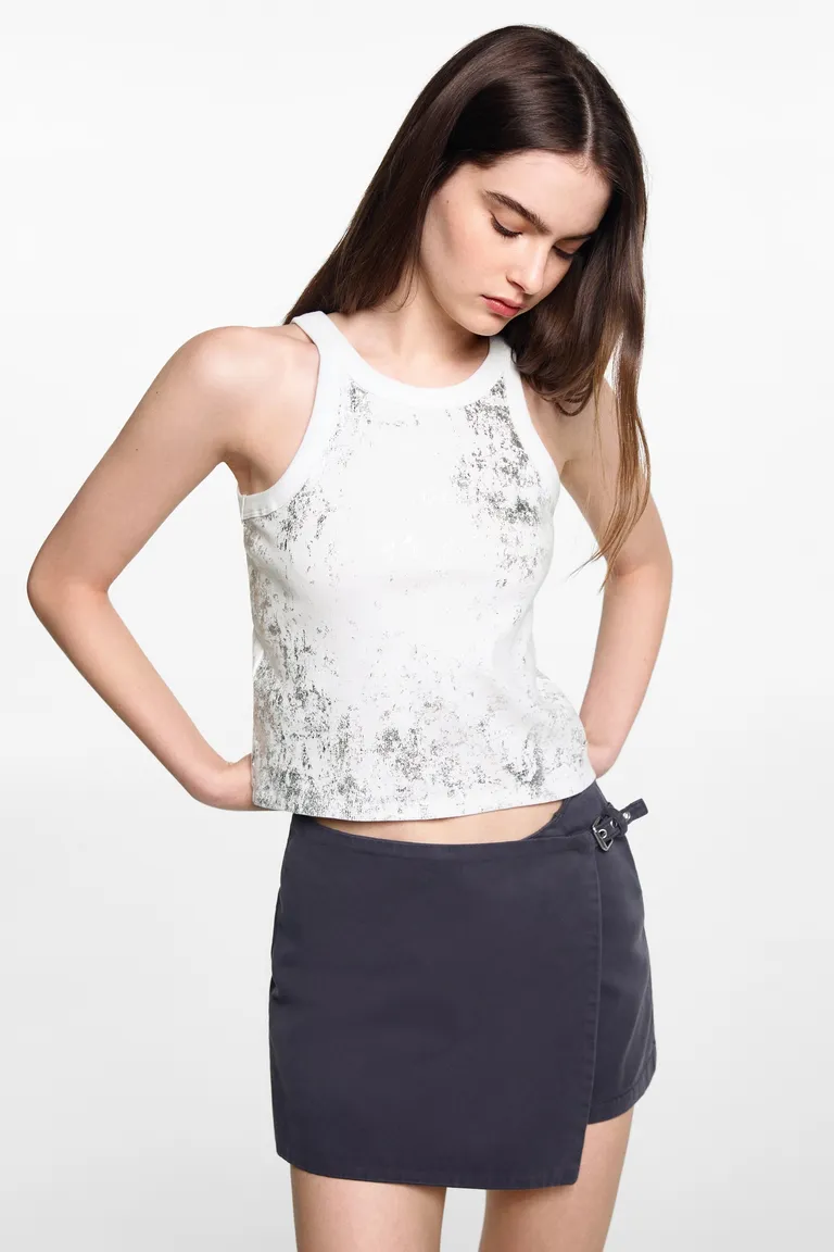 Top detalle metalizado de Mango Teen en Tops para argentina