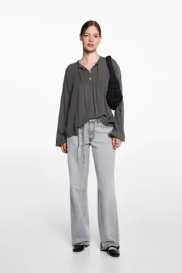 Blusa fluida con lazo de Mango Teen en Blusas para argentina