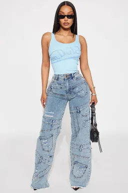 Musculosa von dutch crossover celeste de Fashion Nova en Tops para argentina