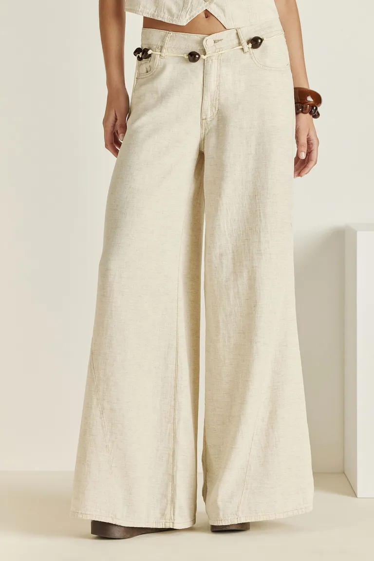 Pantalón de amplia pierna en beige con detalles elegantes para un look sofisticado de Tucci en Pantalones para argentina