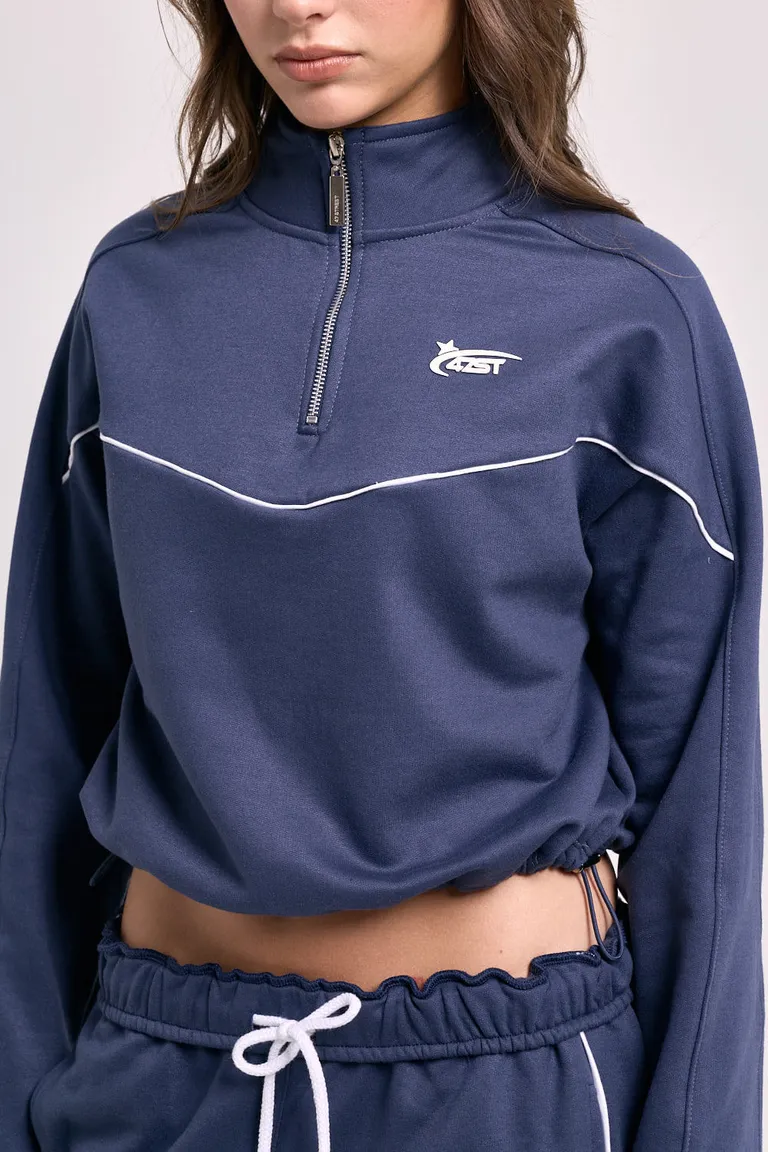 Buzo cropped con medio cierre metálico y recortes laterales distintivos para mujer de 47 Street en Buzos y Sweaters para argentina