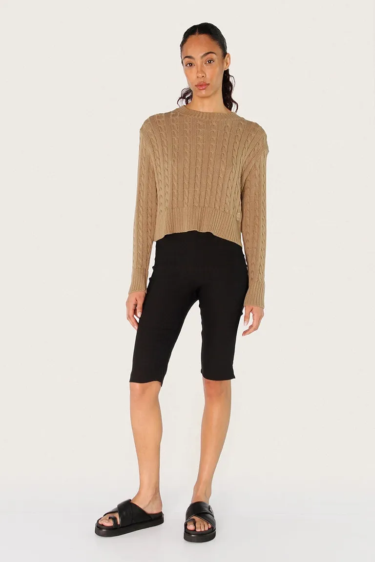 Sweater tejido en ochos con cuello redondo y largo modular por debajo de la cintura de Sofia Sarkany en Buzos y Sweaters para argentina