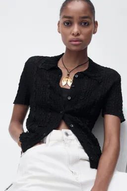 Cárdigan textura cuello polo de Mango en Buzos y Sweaters para argentina