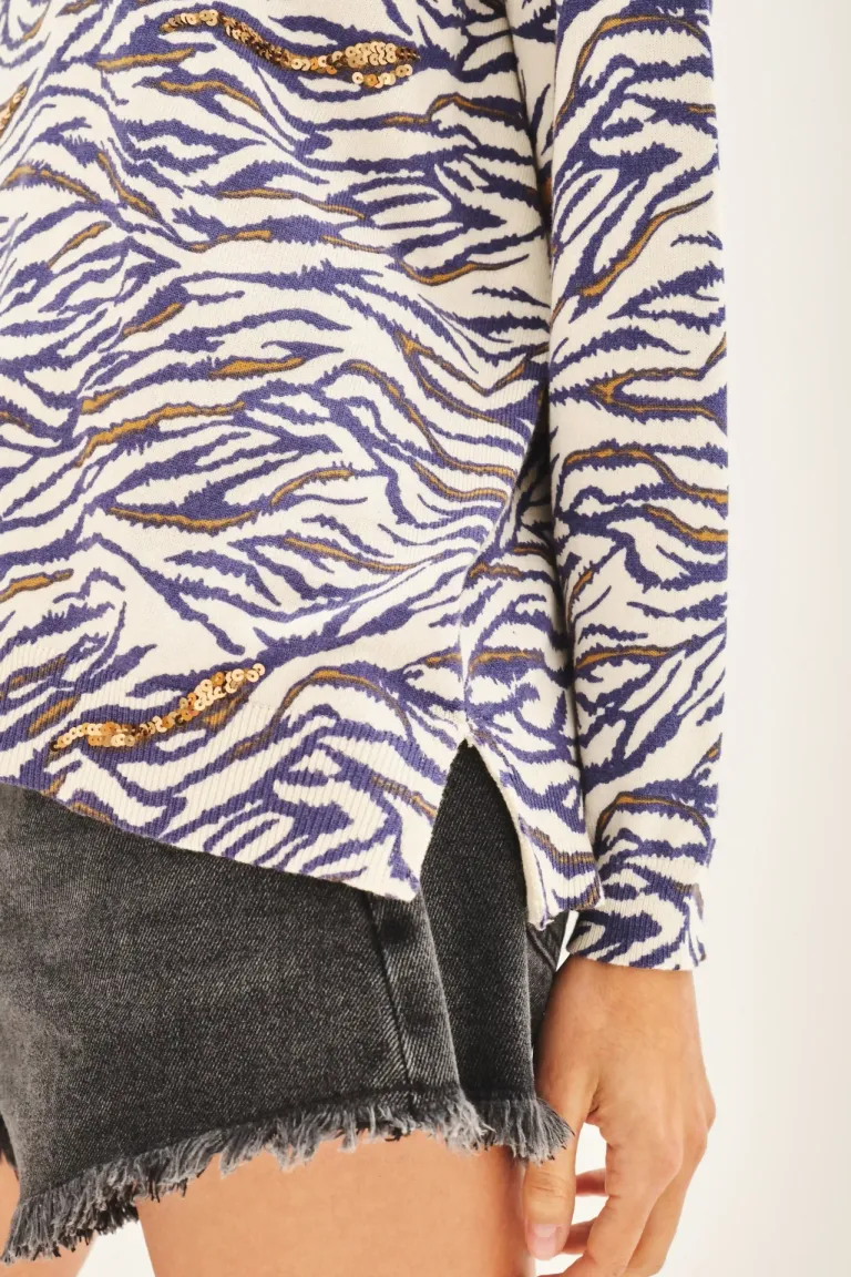 Sweater tejido con estampado animal y detalles de lentejuelas de Rapsodia en Buzos y Sweaters para argentina