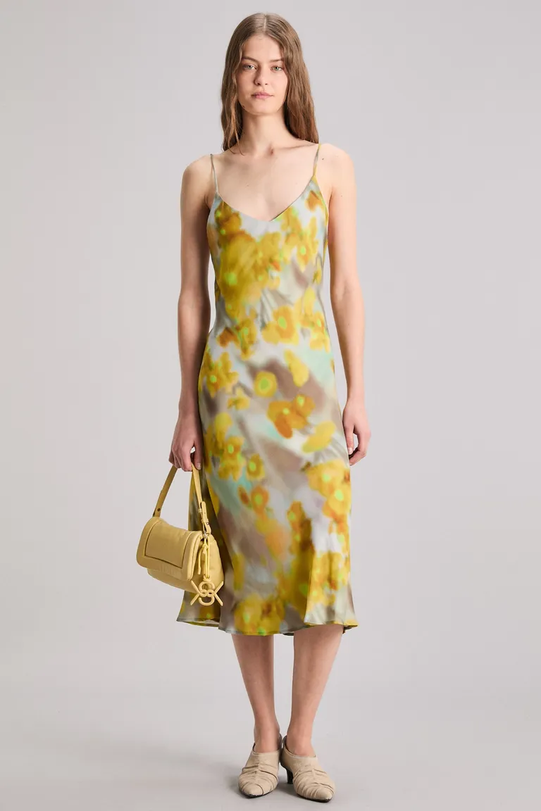 Vestido midi de escote en V con estampado floral en tonos amarillos de Kosiuko en Vestidos para argentina