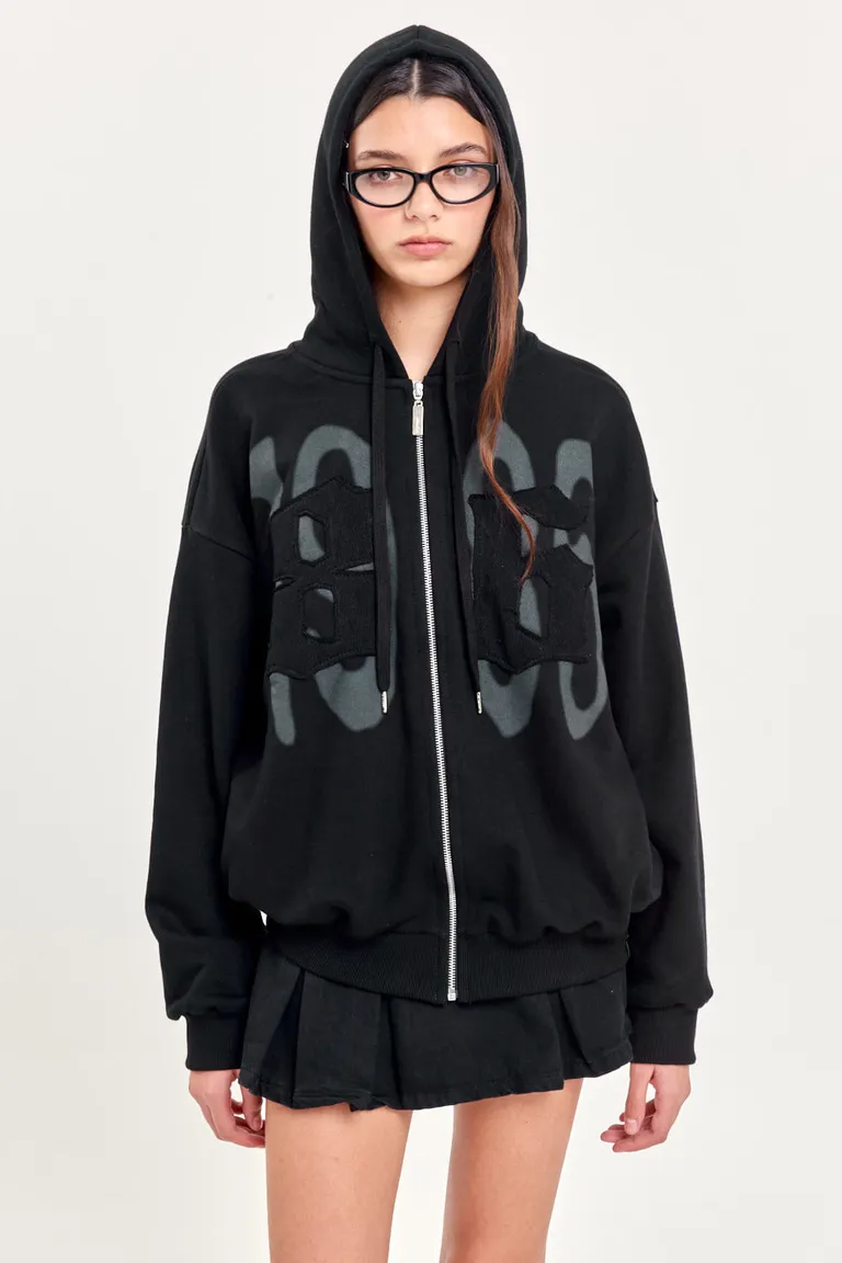 Campera de frisa negra de silueta amplia con detalles distintivos de 47 Street en Buzos y Sweaters para argentina