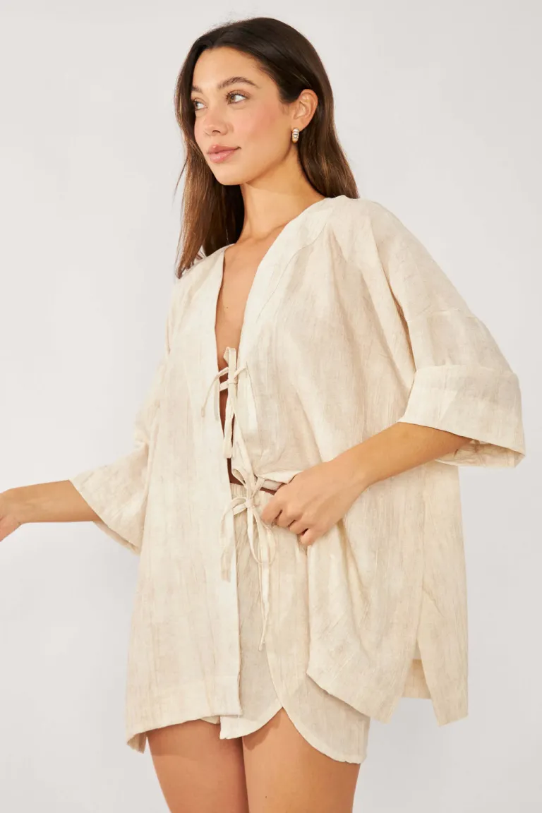 Blusa abierta con tiras plisadas, un diseño sofisticado y versátil para la mujer de Belle en Blusas para argentina