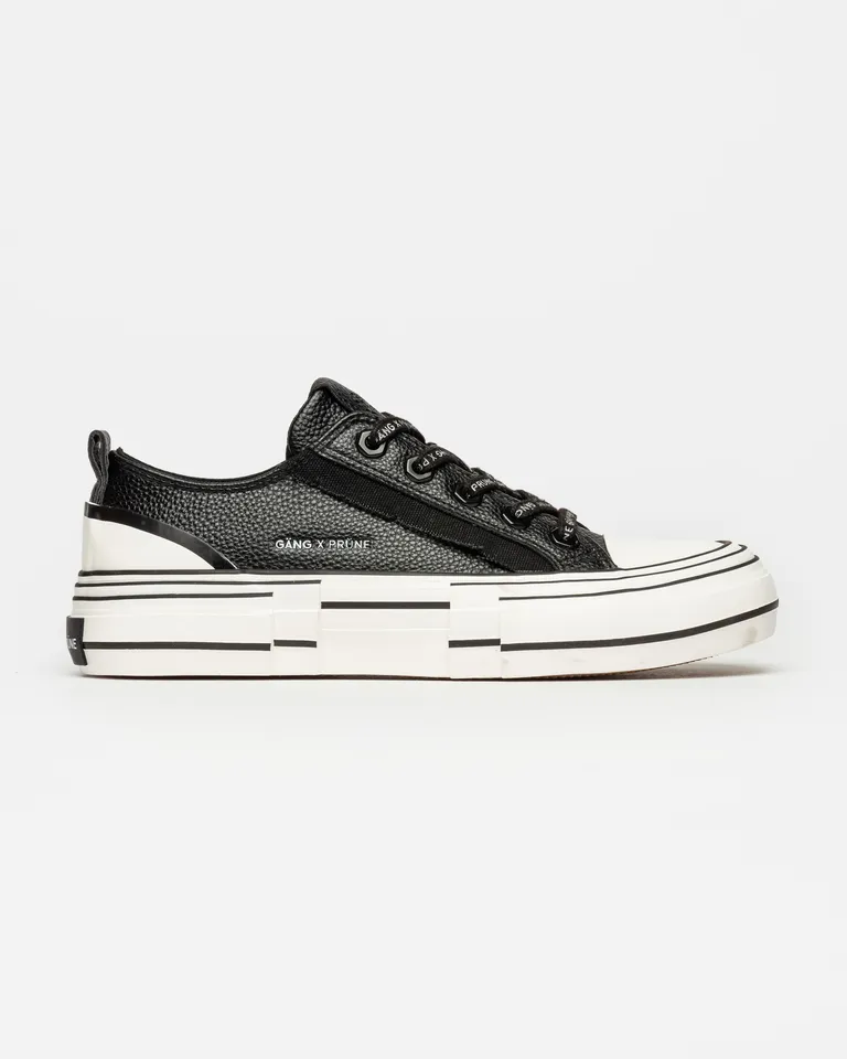 Zapatillas con efecto cuero y detalles de lona desflecada para un estilo moderno y versátil de Prüne en Zapatillas para argentina