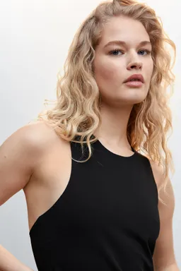 Vestido asimétrico espalda descubierta de Mango en Vestidos para argentina
